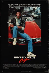 4g0804 BEVERLY HILLS COP 1sh 1984 great image of detective Eddie Murphy sitting on red Mercedes!
