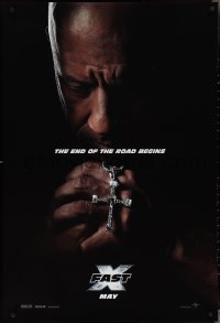 4g0867 FAST X teaser DS 1sh 2023 image of Vin Diesel praying with diamond-studded cross in hands!
