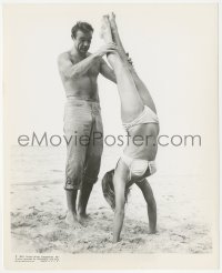 4y1169 DR. NO candid 8x10 still 1963 Sean Connery helps sexy Ursula Andress do a handstand on beach!