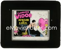 5b1502 AFRAID TO LOVE glass slide 1927 art of Cupid & Florence Vidor staring at suitors in mirror!
