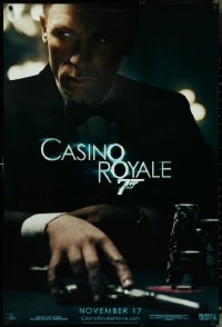 5c0581 CASINO ROYALE teaser 1sh 2006 Craig as James Bond sitting at poker table w/gun!
