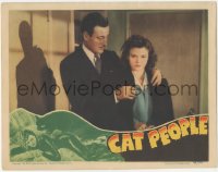 5f0252 CAT PEOPLE LC 1942 great close up of Tom Conway putting sexy Simone Simon's coat on her!