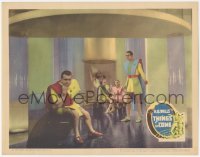 5f0406 THINGS TO COME LC 1936 Raymond Massey & others wearing wacky clothes of the future, Menzies!
