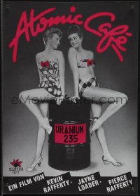 5g0359 ATOMIC CAFE German 12x19 1982 sexy image of women in swimsuits with barrel of Uranium!