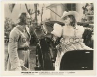 5r1759 CAPTAIN BLOOD 8x10.25 still 1935 Olivia De Havilland in buggy smiling at Errol Flynn!