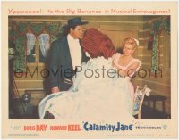 5r1180 CALAMITY JANE LC #2 1953 Howard Keel stares at Doris Day frustrated with wedding dress!