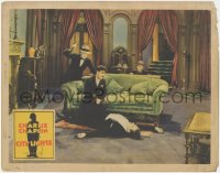 5r1187 CITY LIGHTS LC 1931 Charlie Chaplin on couch looking at man in floor is about to get whacked!