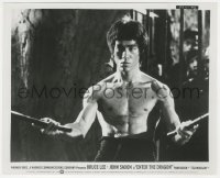 6f1498 ENTER THE DRAGON 8x10 still 1973 great close up of barechested Bruce Lee rescuing prisoners!