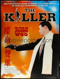 6g0043 KILLER French 1p 1995 John Woo directed, cool close up of Chow Yun-Fat with pistol!