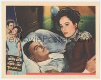 6j0609 TEMPTATION LC #5 1946 c/u of Merle Oberon looking away from George Brent laying in bed!