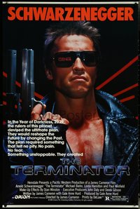 6k0946 TERMINATOR 1sh 1984 close up of classic cyborg Arnold Schwarzenegger with gun, border style!