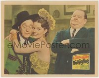 6p0635 BULLFIGHTERS LC 1945 pretty Margo Woode hugs Stan Laurel as Oliver Hardy disapproves!